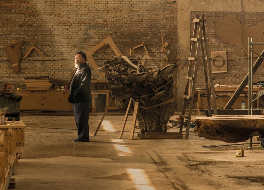 Ai Weiwei in his studio in Beijing, taken in April 2015 . Photo (c) Harry Pearce/Pentagram, 2015.